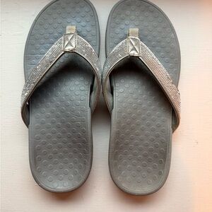 Silver and Gray Vionic Flip Flops